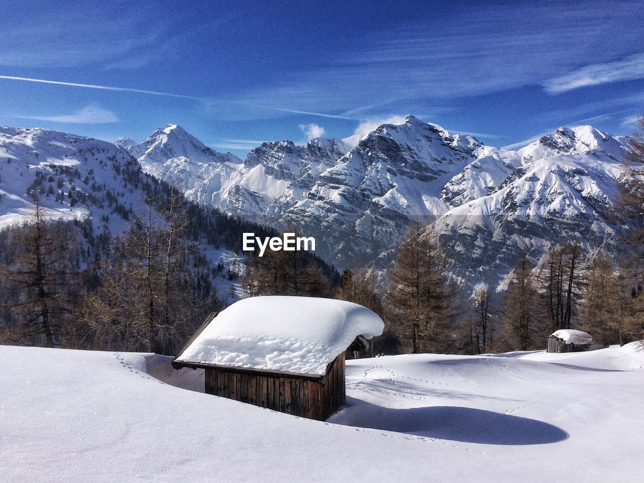 Snow covered mountains against sky