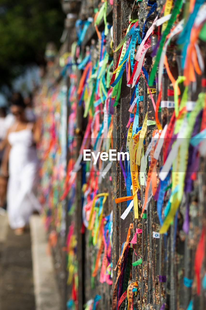 Remembrance ribbons tied to the iron railing of the senhor do bonfim church