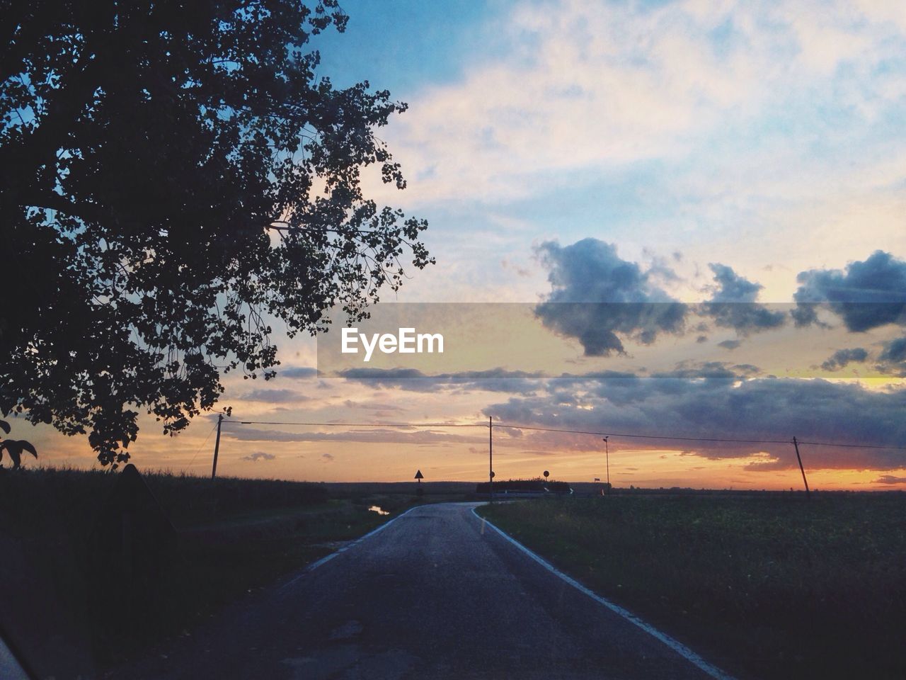 Empty country road along landscape