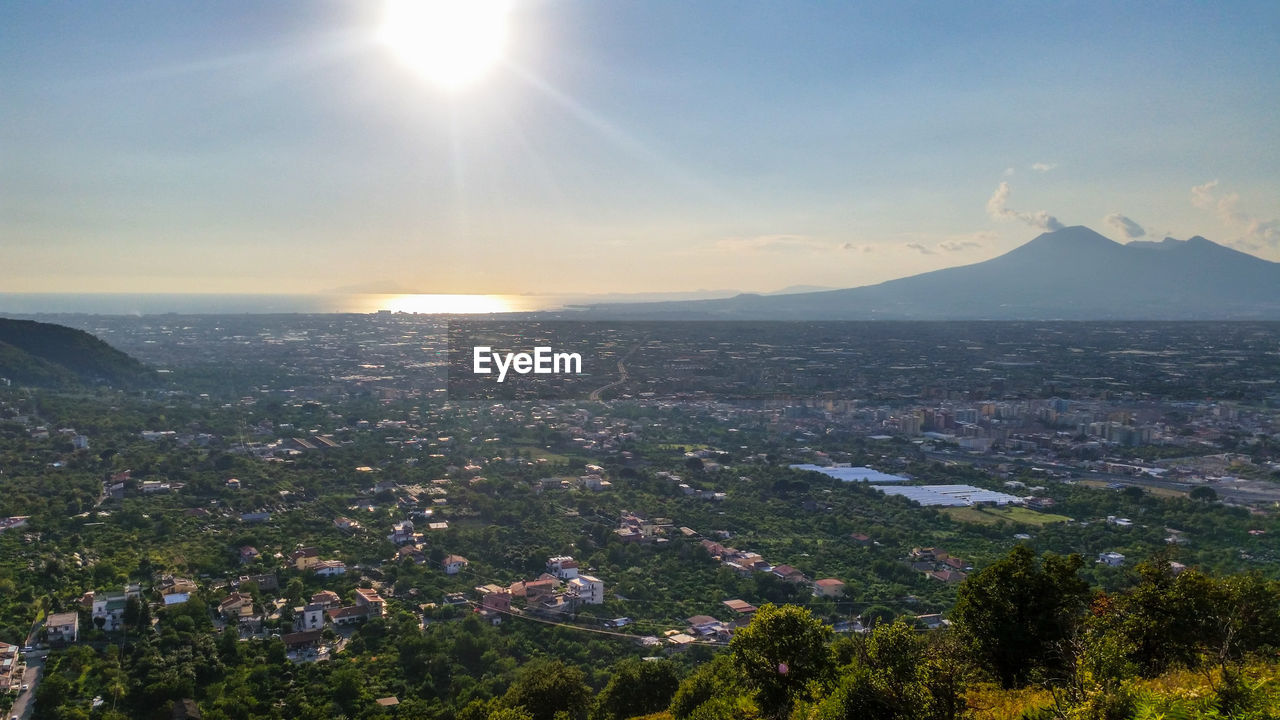 Aerial view of townscape against sky