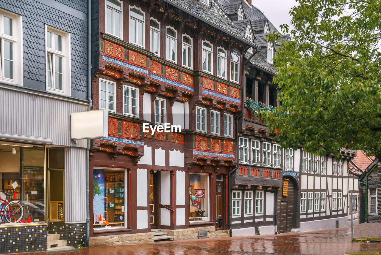 Street with old decorative houses in goslar, germany