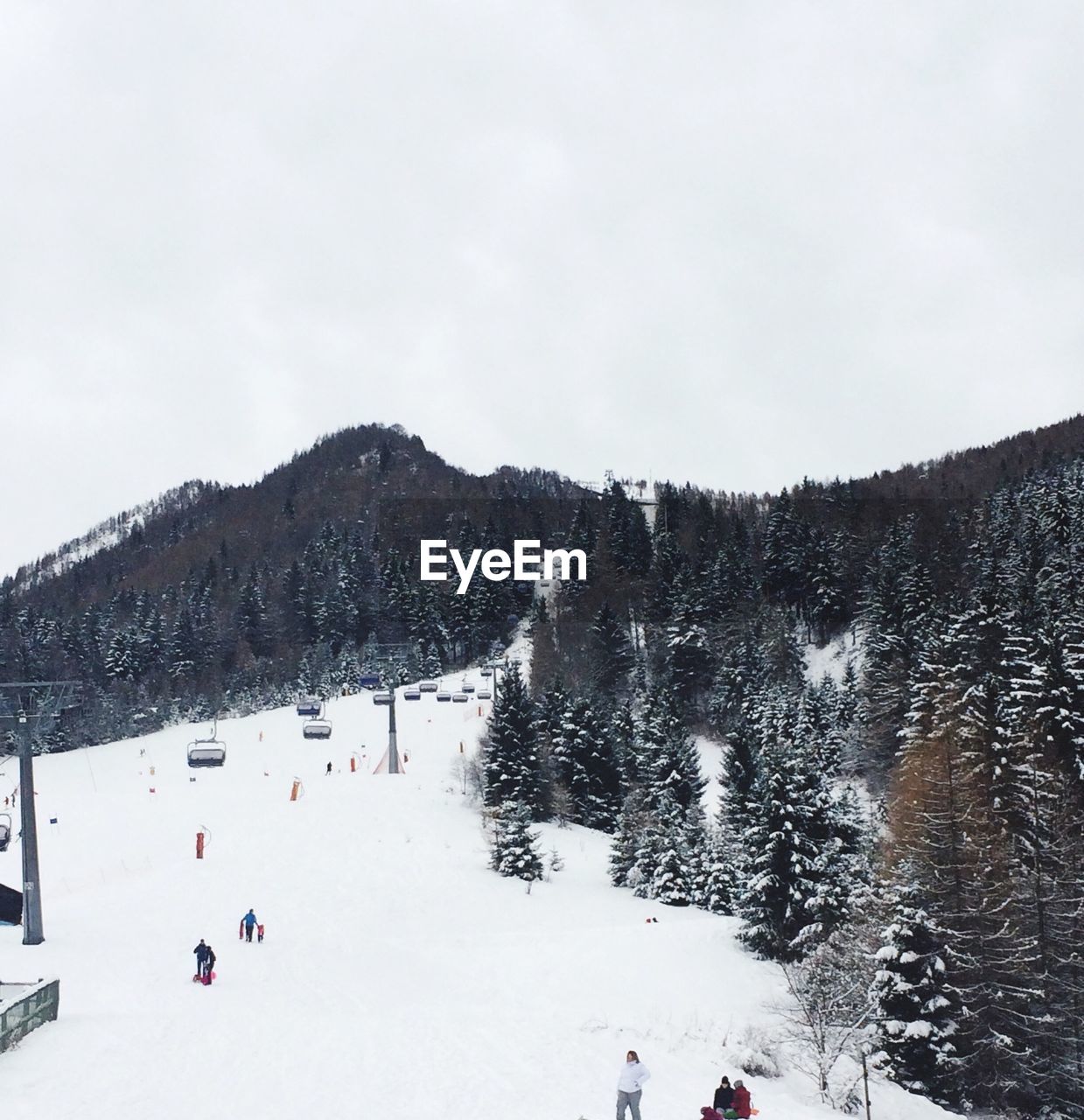 Scenic view of snow covered mountain against sky