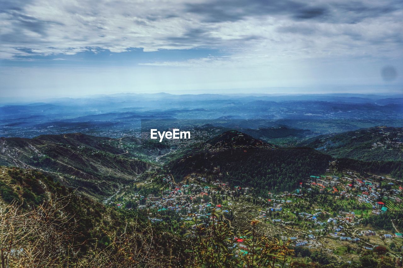 Aerial view of trees against sky