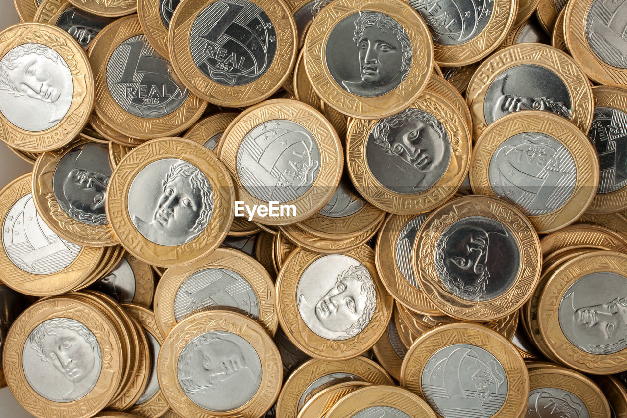 FULL FRAME SHOT OF COINS WITH TEXT