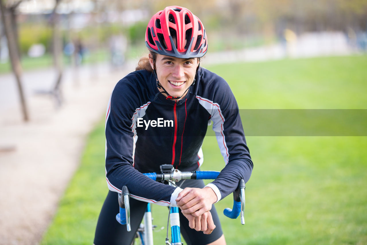 Portrait of male athlete on bicycle