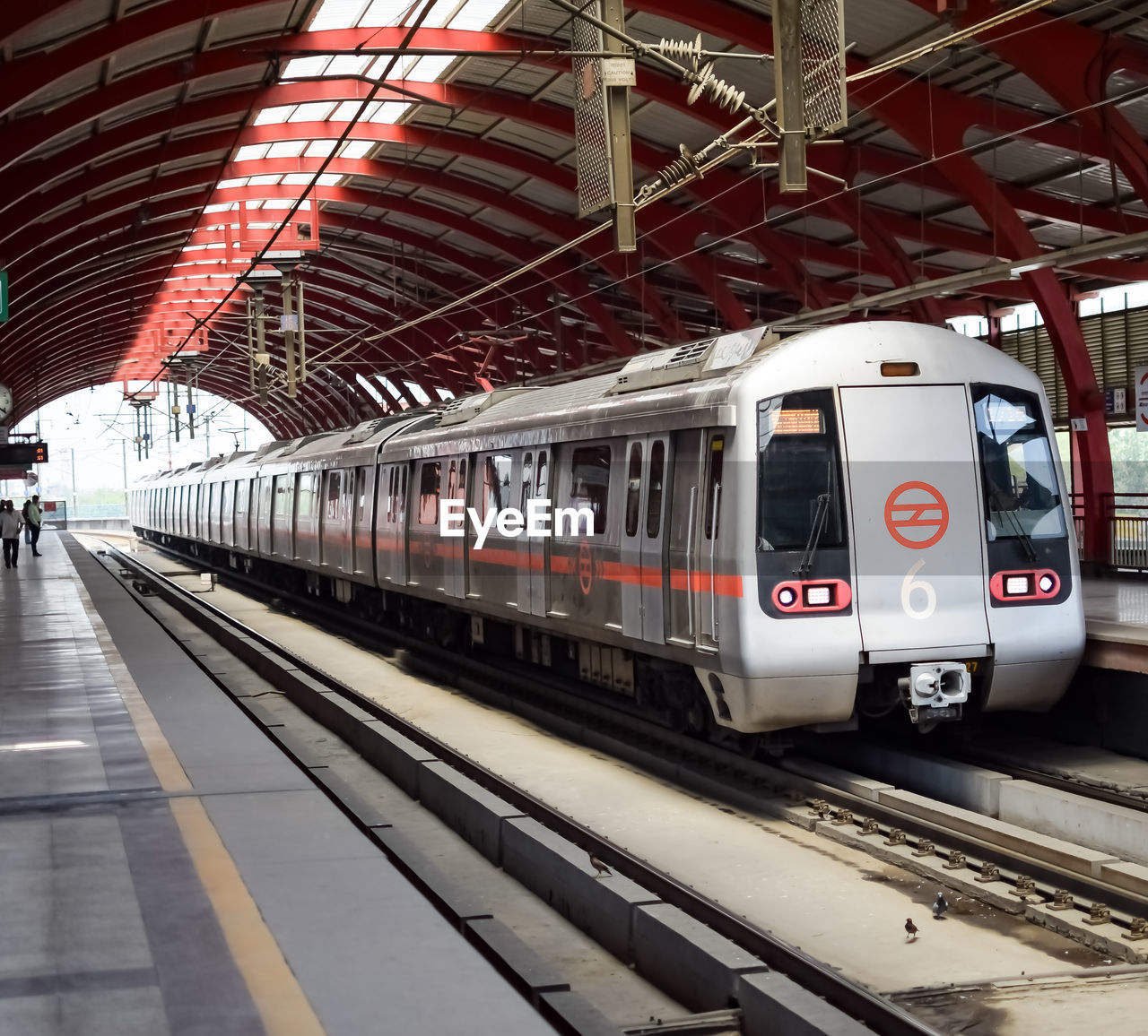 Delhi metro train arriving at jhandewalan metro station in new delhi, india, asia, public metro