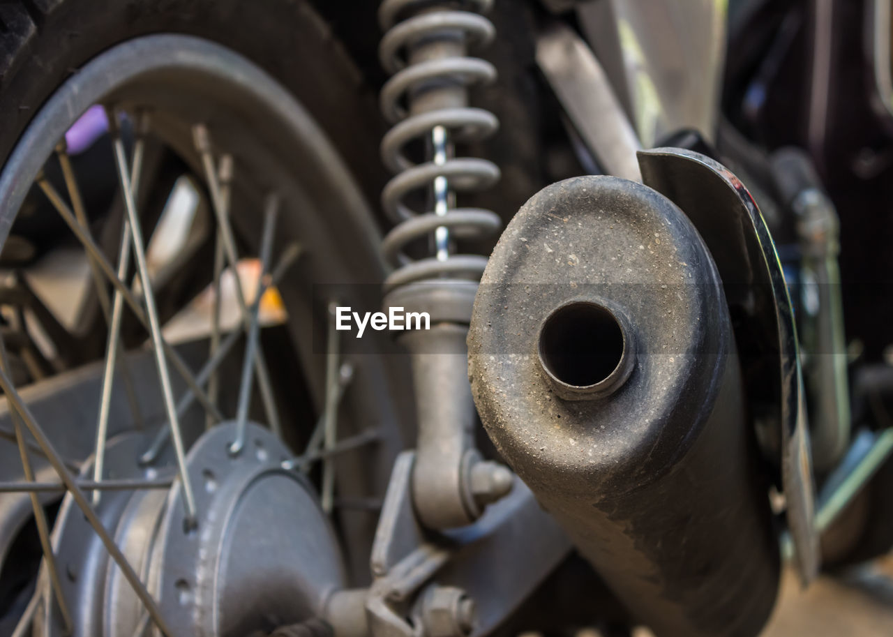 CLOSE-UP OF BICYCLE WHEEL IN CONTAINER