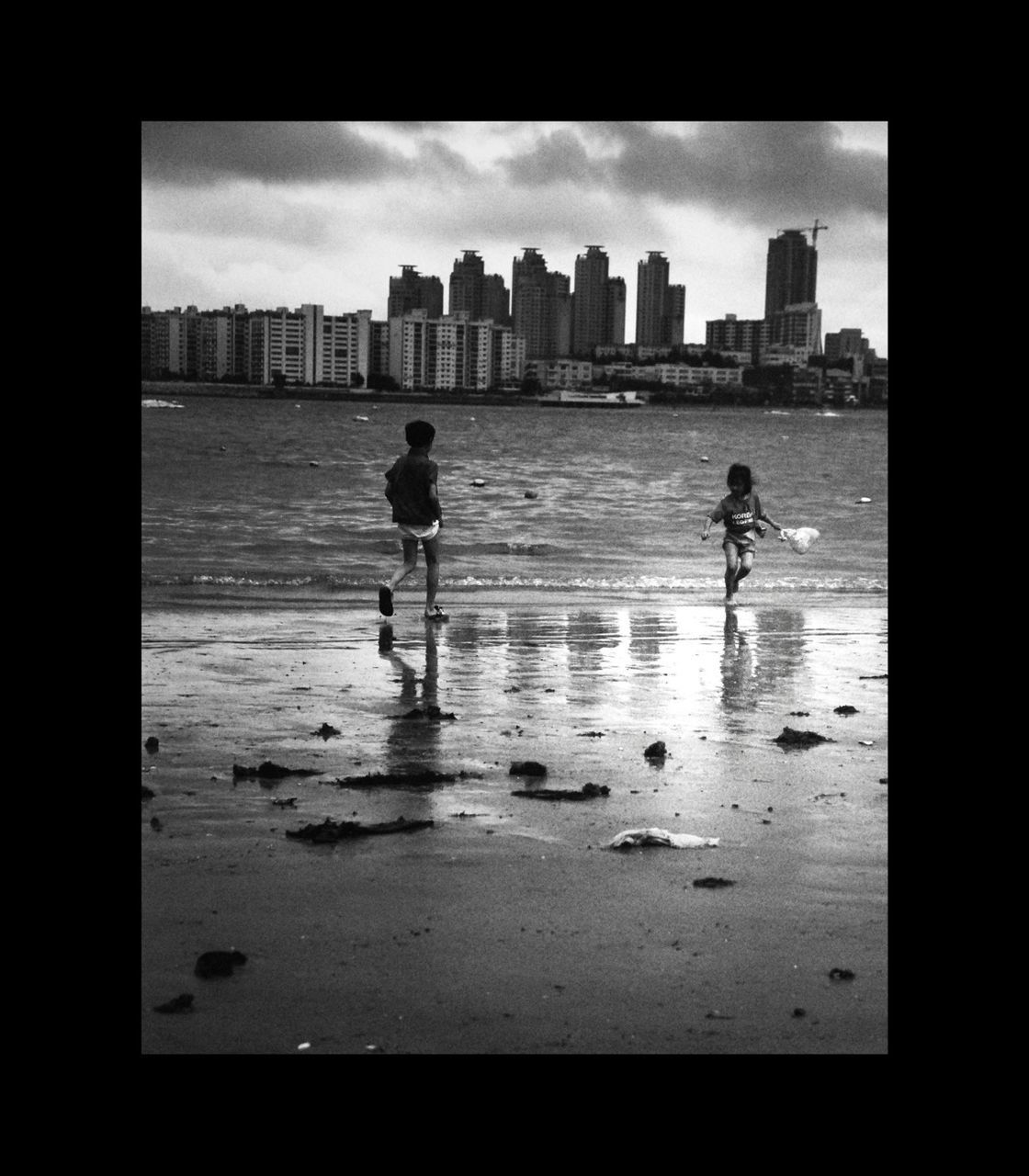 WOMAN STANDING ON BRIDGE