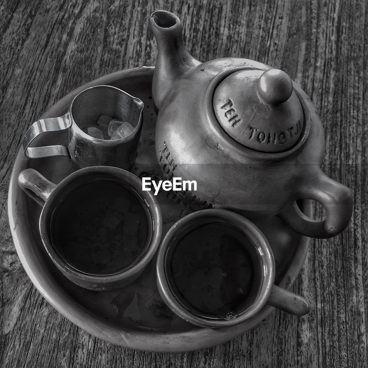 CLOSE-UP OF TEA CUP ON TABLE