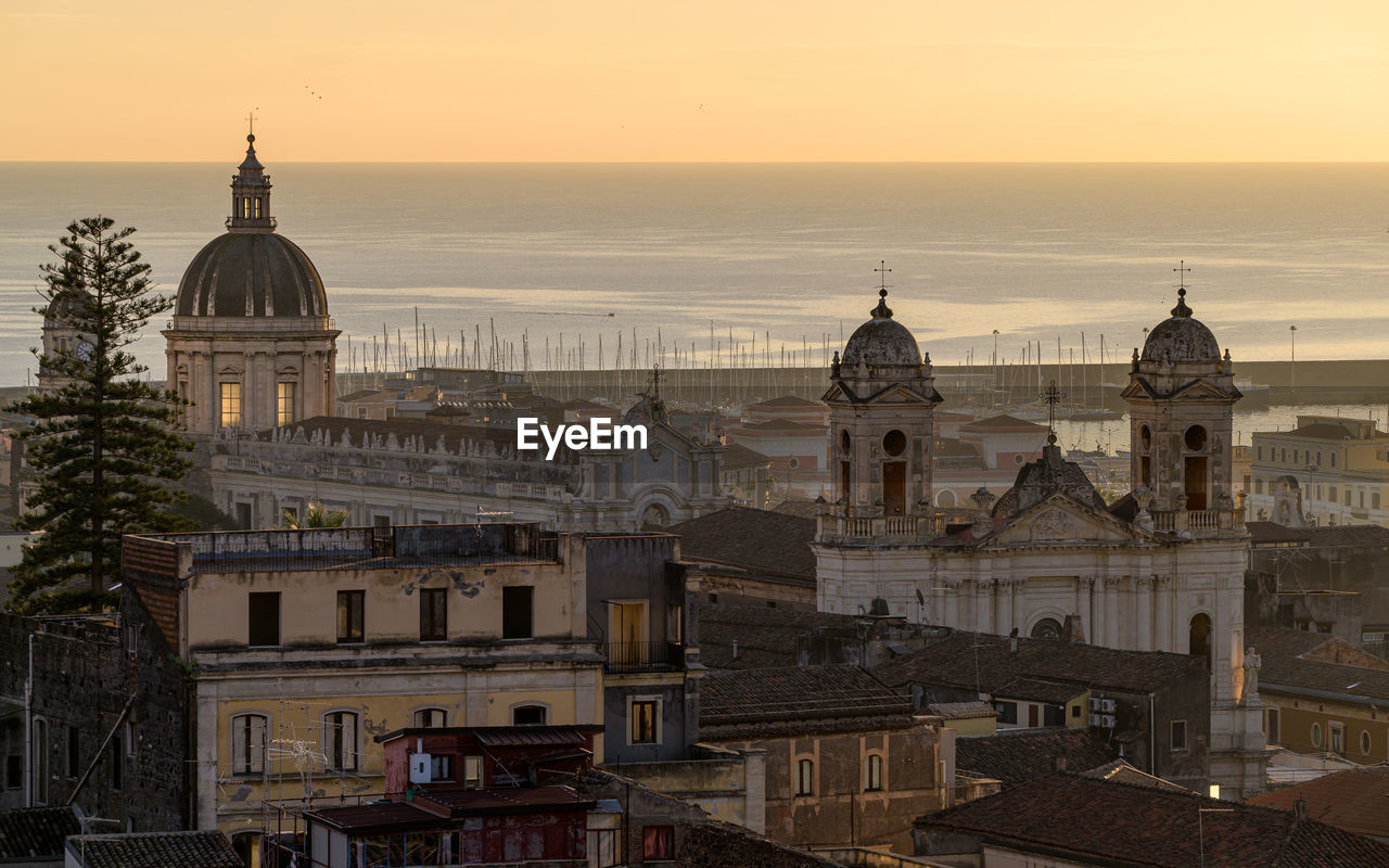 Cupola of saint agatha cathedral at sunrise, aerial view catania city, sicily, italy 