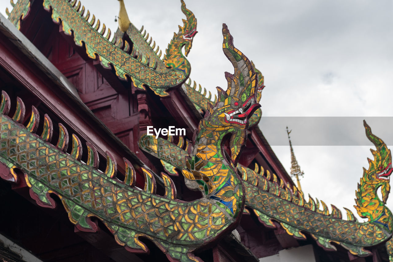 Low angle view of statue of temple