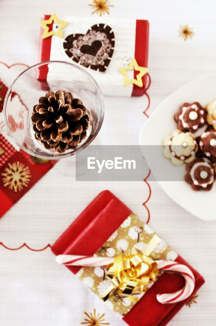 HIGH ANGLE VIEW OF SWEET FOOD ON TABLE