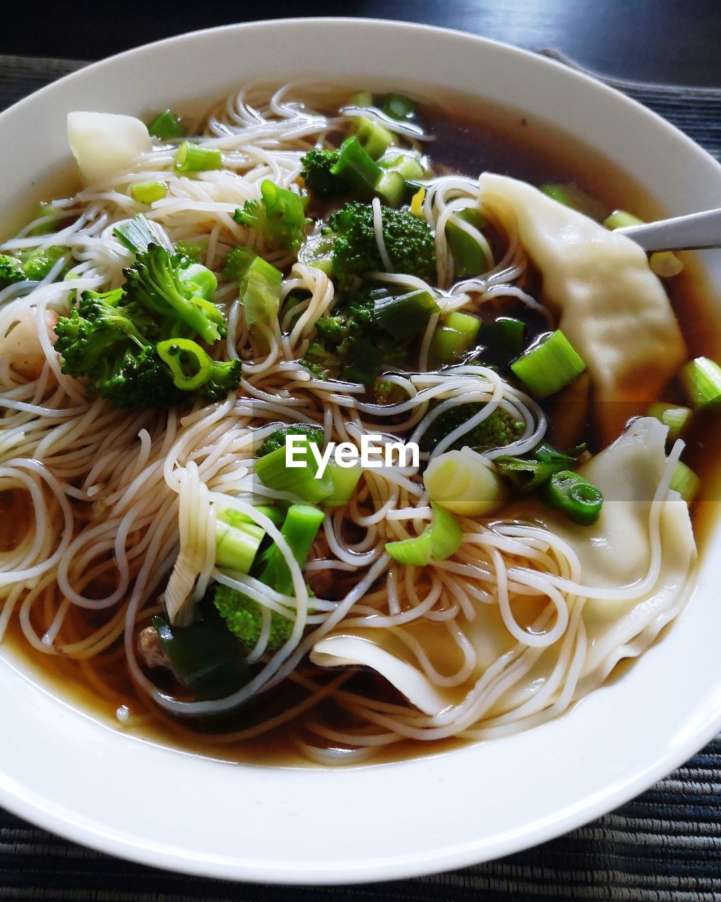 HIGH ANGLE VIEW OF SOUP IN BOWL WITH RICE