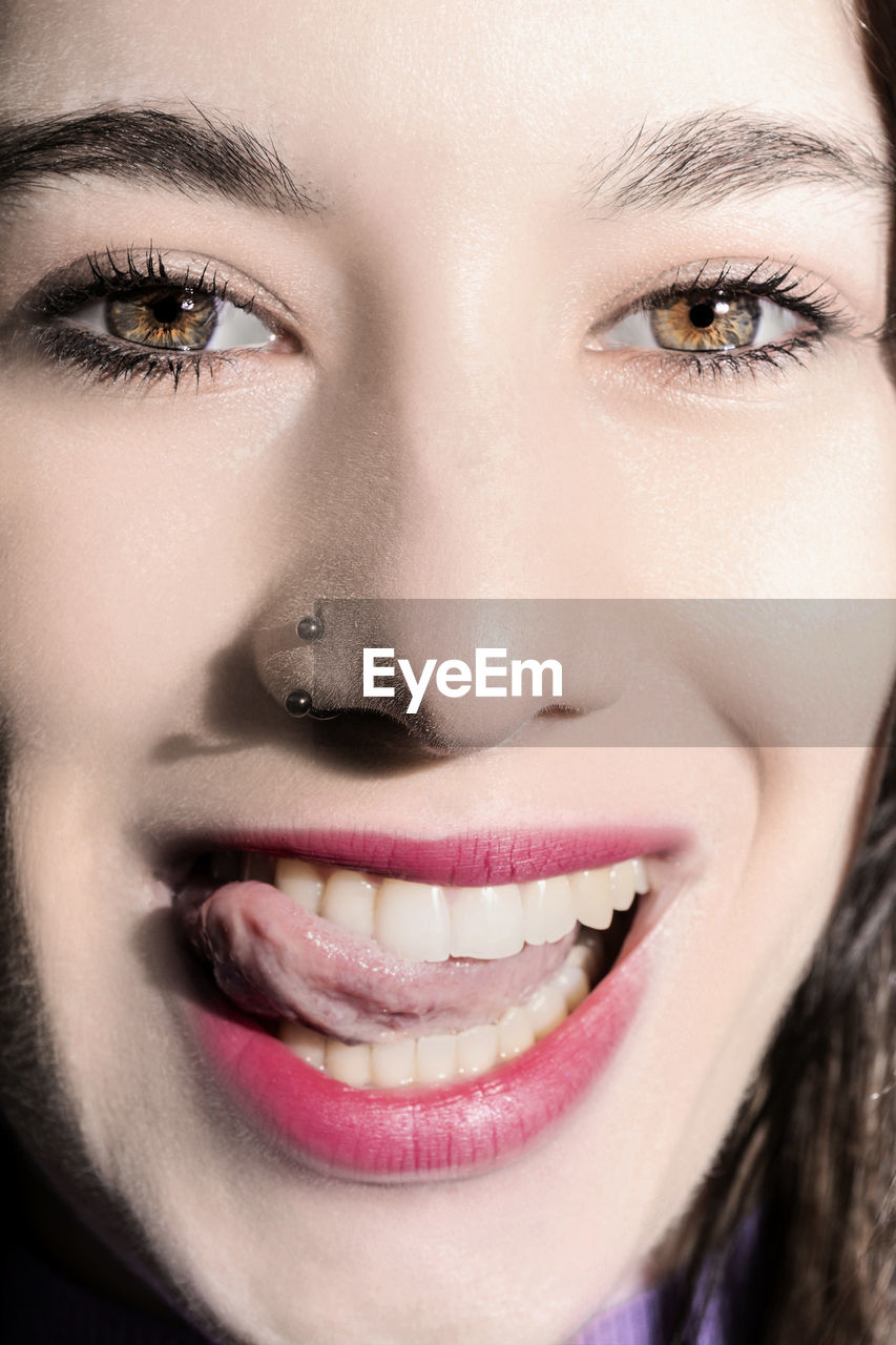 human face, portrait, adult, women, young adult, one person, make-up, close-up, human eye, lip, looking at camera, nose, smiling, skin, headshot, eyebrow, fashion, eyelash, studio shot, human head, indoors, human lips, emotion, human mouth, female, front view, happiness, portrait photography, lipstick, glamour, eye, cheek, brown hair, person