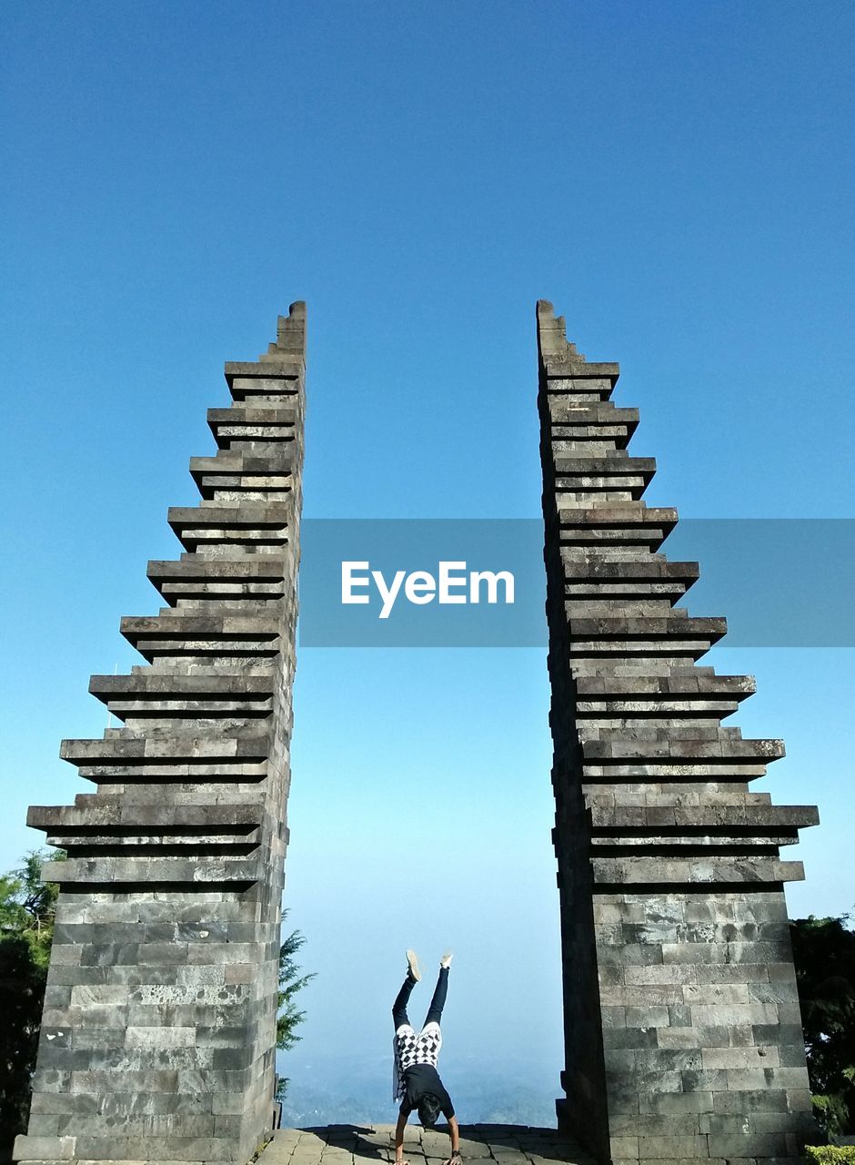 TRADITIONAL BUILDING AGAINST BLUE SKY