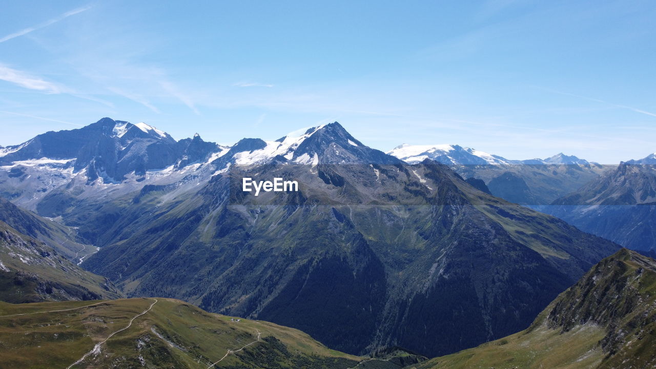 Scenic view of snowcapped mountains against sky