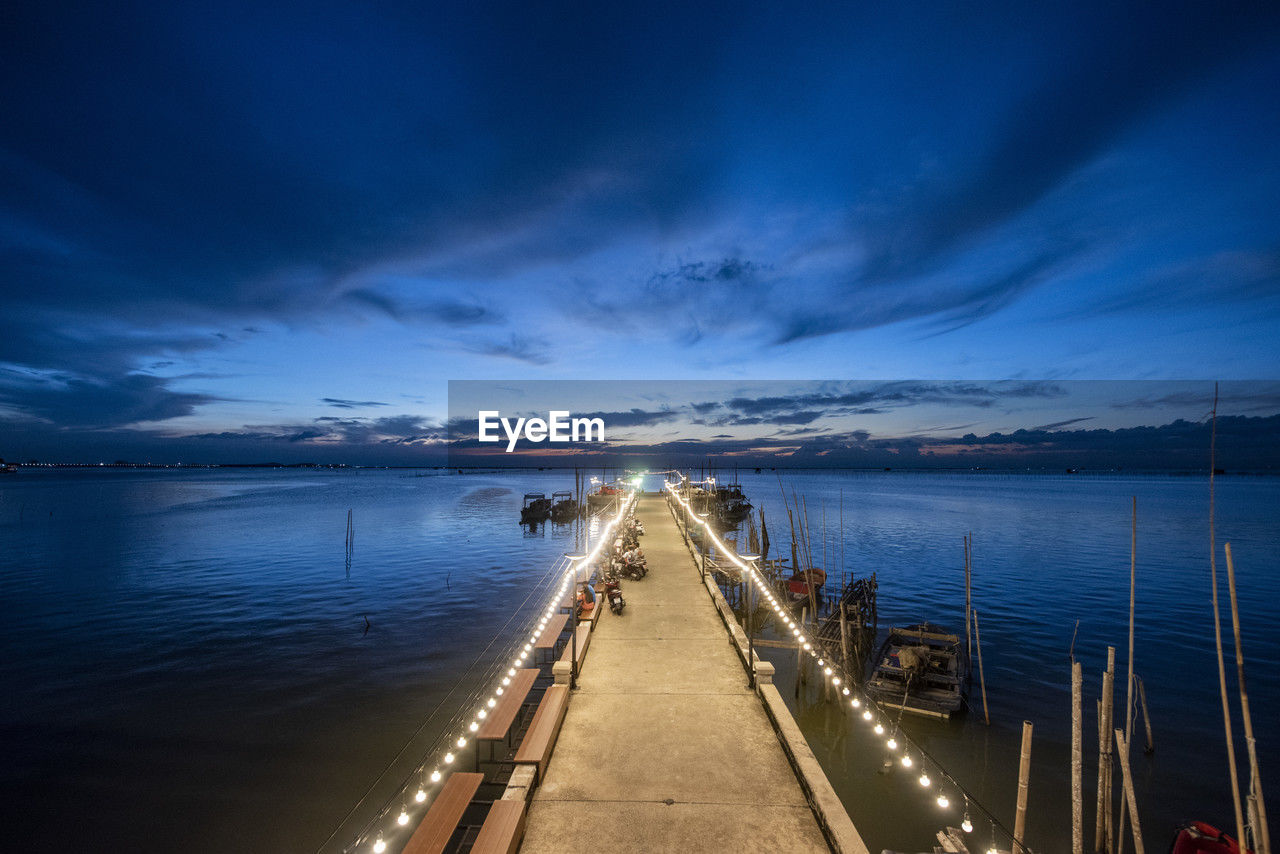 pier over sea against sky