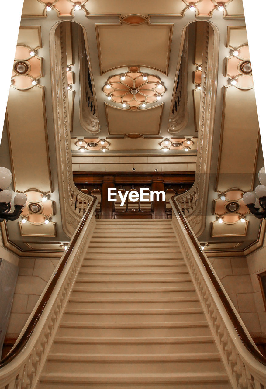 INTERIOR OF ILLUMINATED SHOPPING MALL