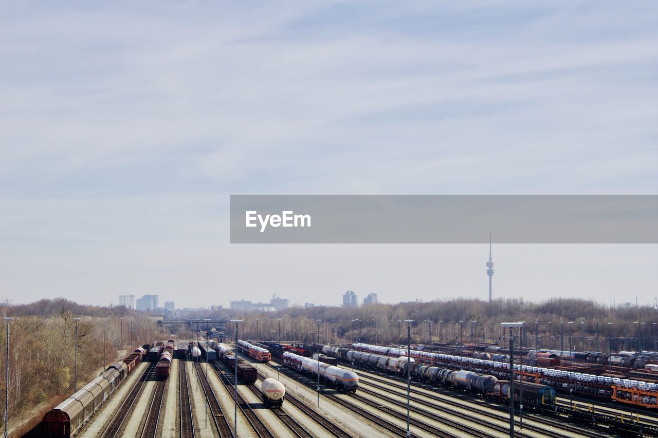 HIGH ANGLE VIEW OF TRAIN AGAINST SKY