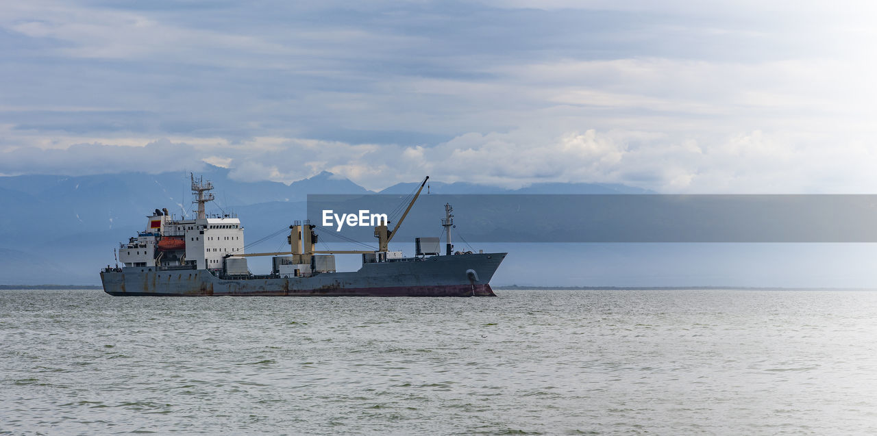 Large cargo container ship sailing