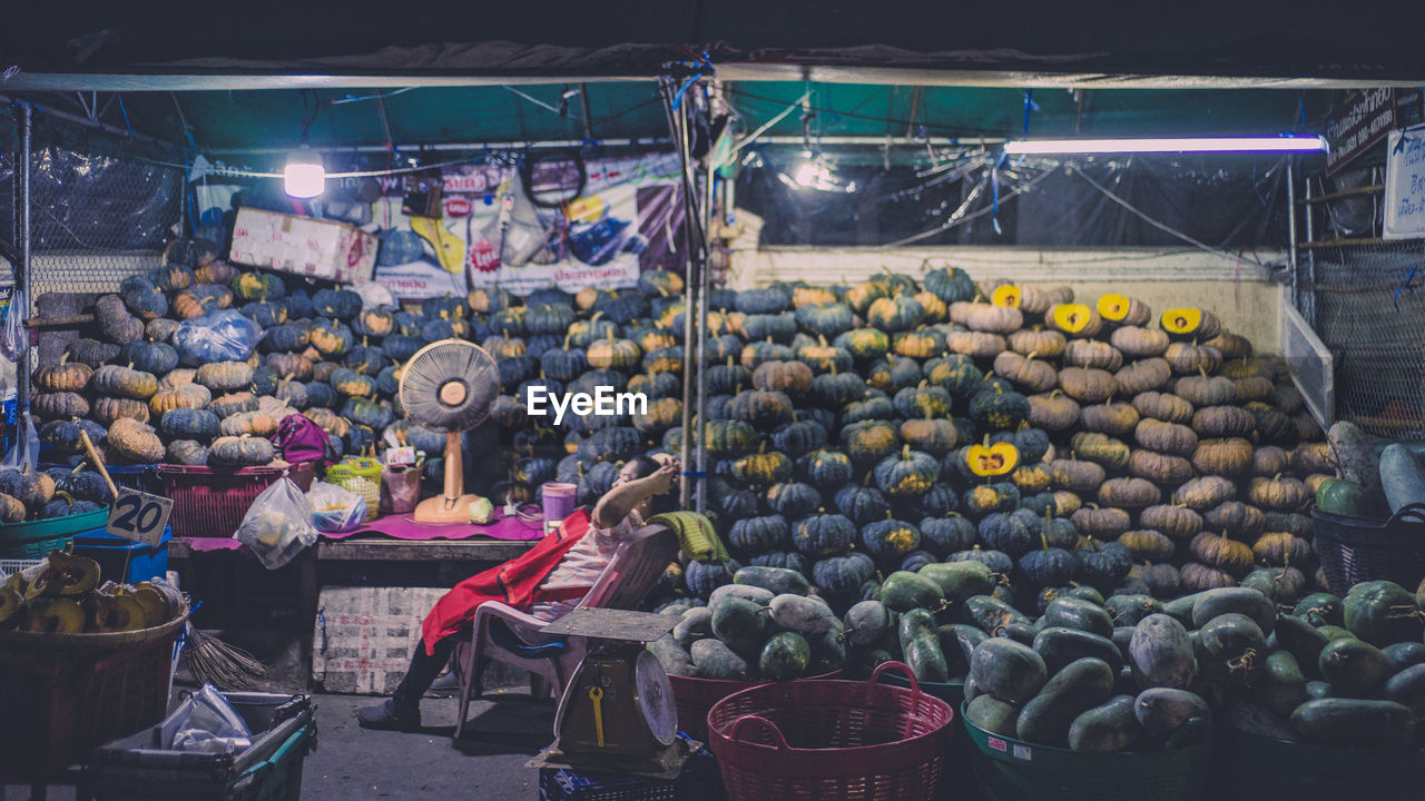 VARIOUS FRUITS FOR SALE IN MARKET STALL