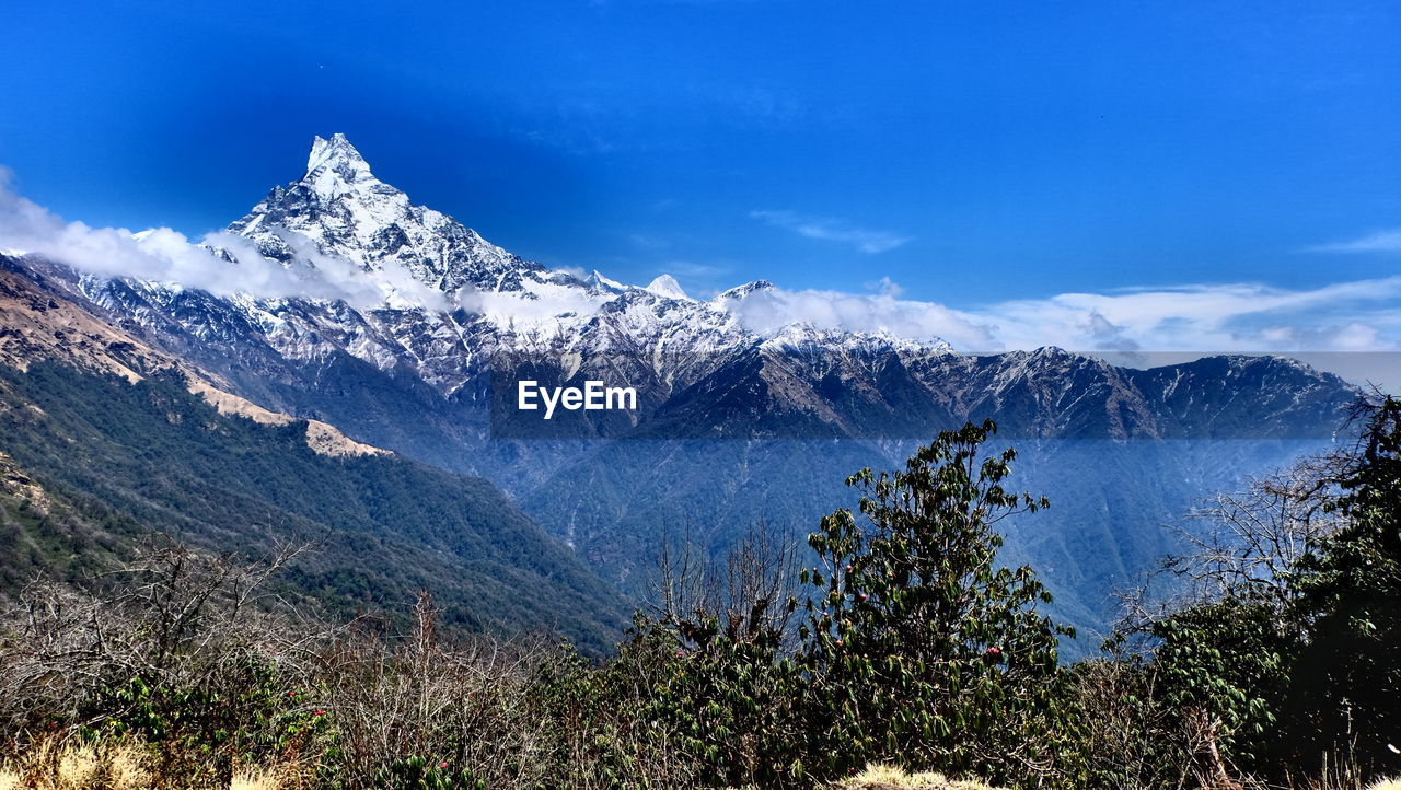 Scenic view of mountains against sky