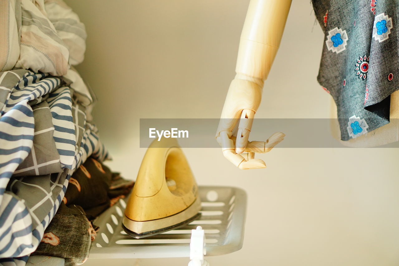 Laundry and iron on table