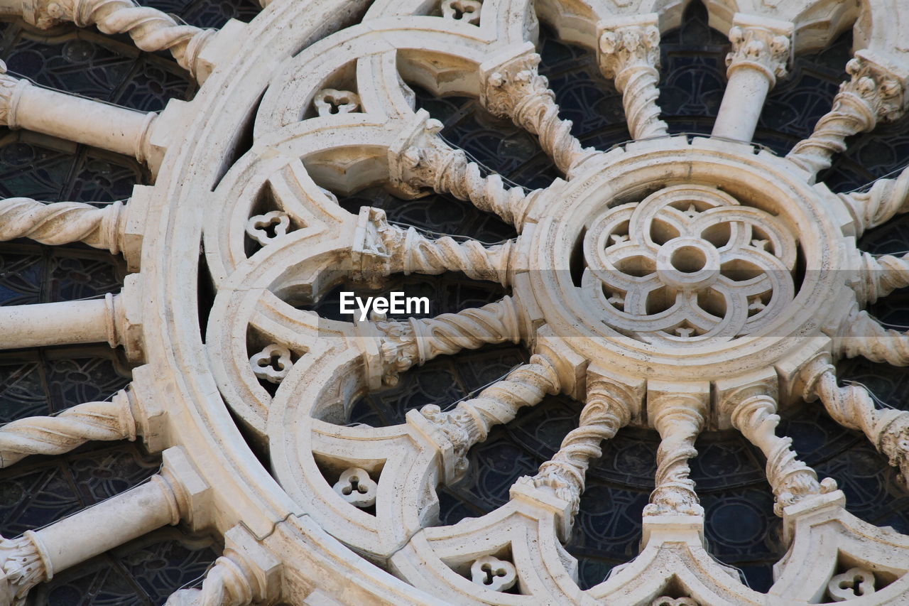 iron, art, no people, pattern, stone carving, wood, shape, wheel, sculpture, circle