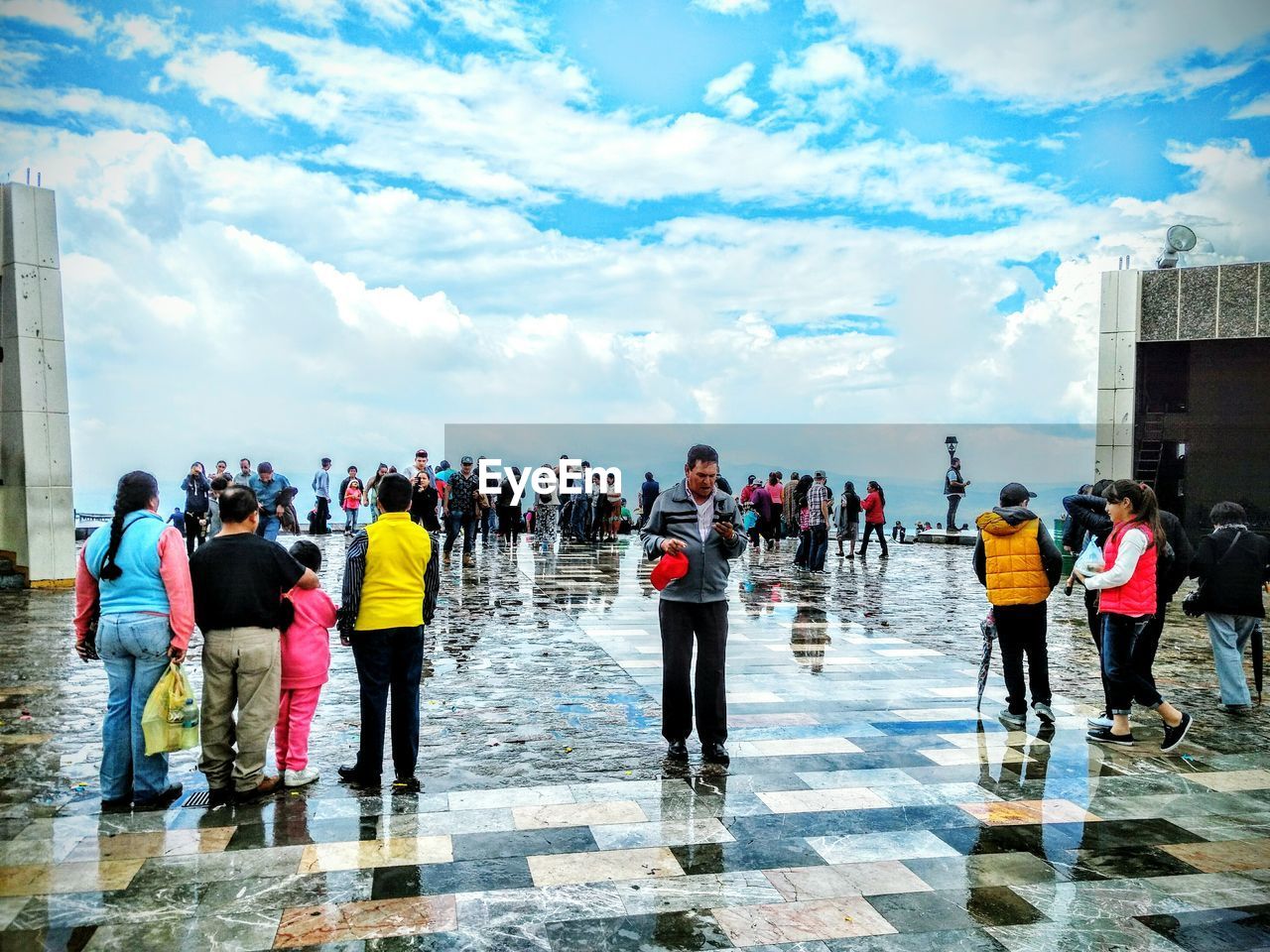 GROUP OF PEOPLE WALKING ON WATER