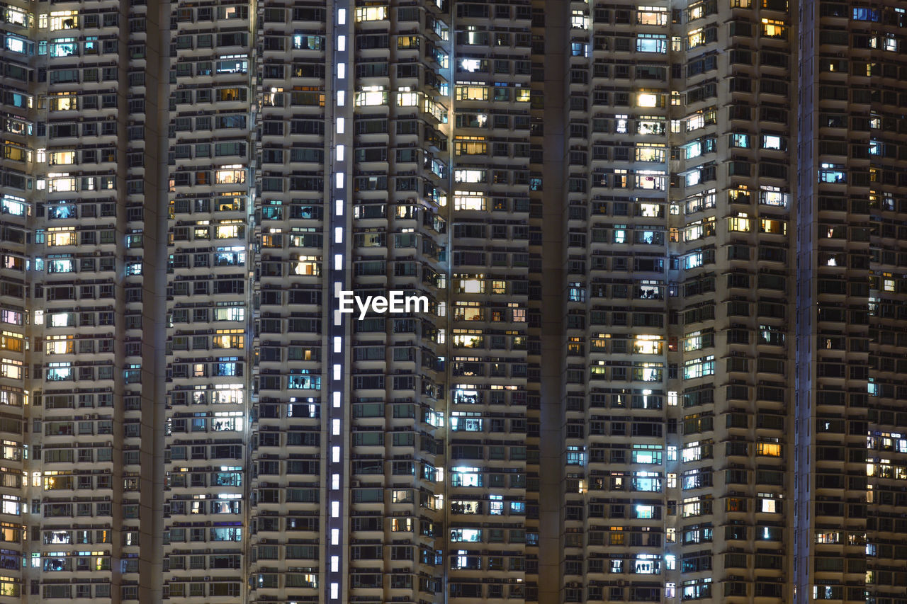 Full frame shot of illuminated buildings at night