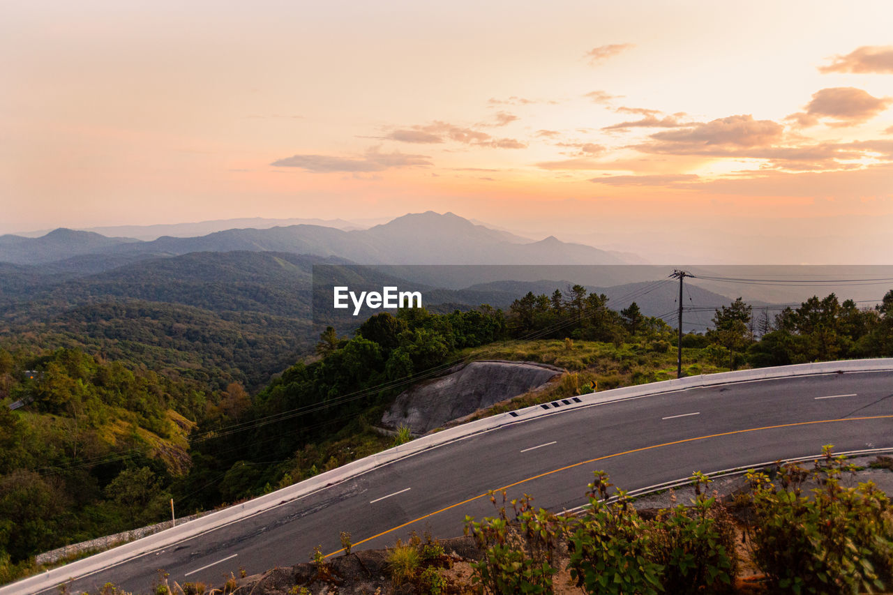 Scenic view of mountains against sky during sunset