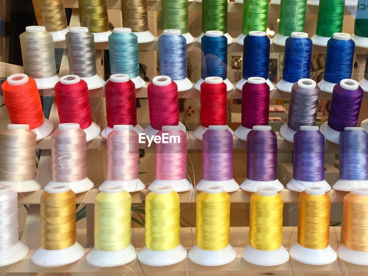 Full frame shot of colorful thread spools