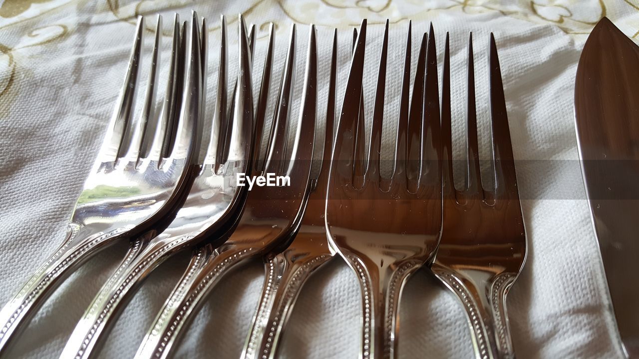 Close-up of forks on table 