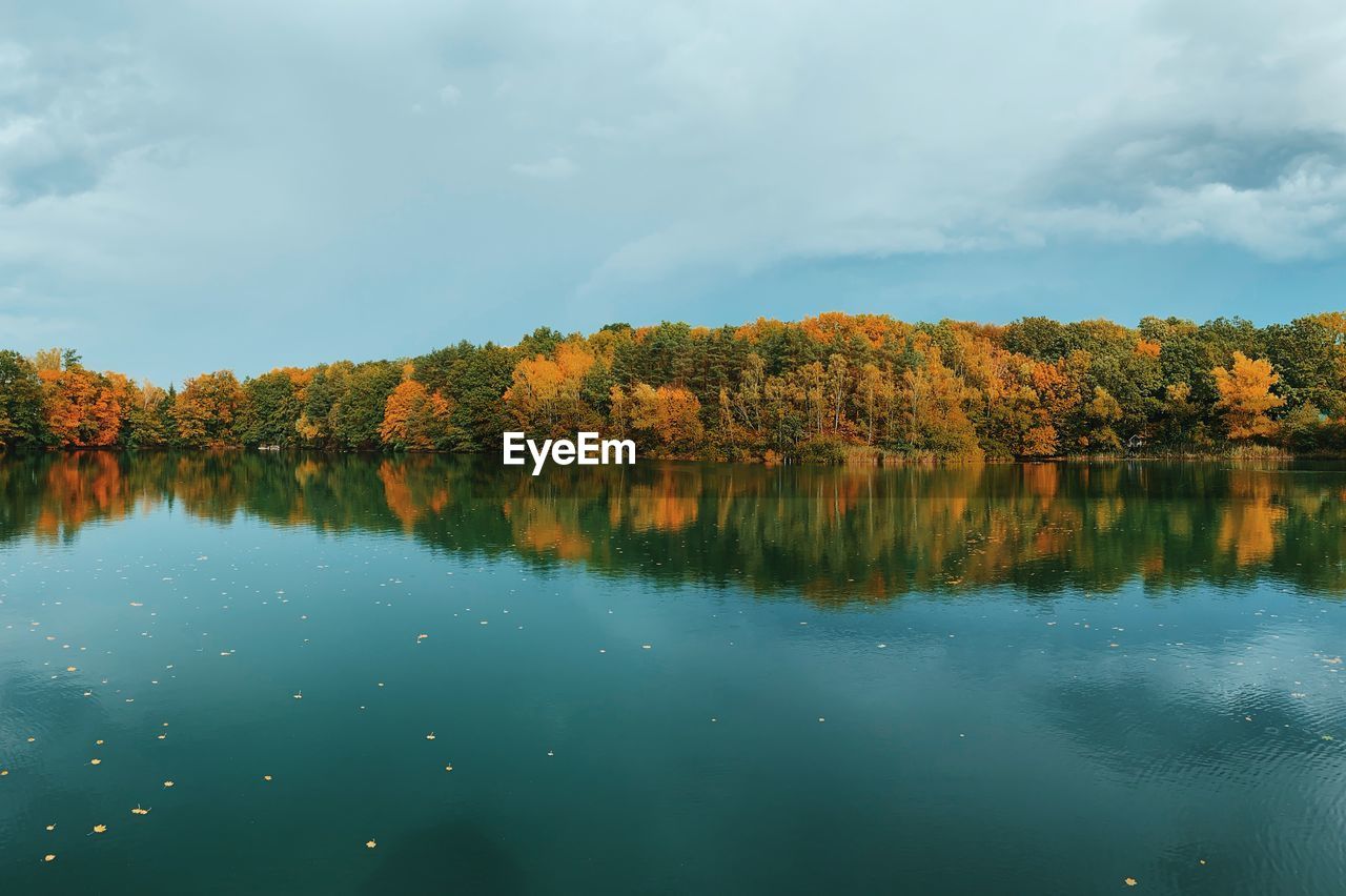 Scenic view of lake against sky during autumn