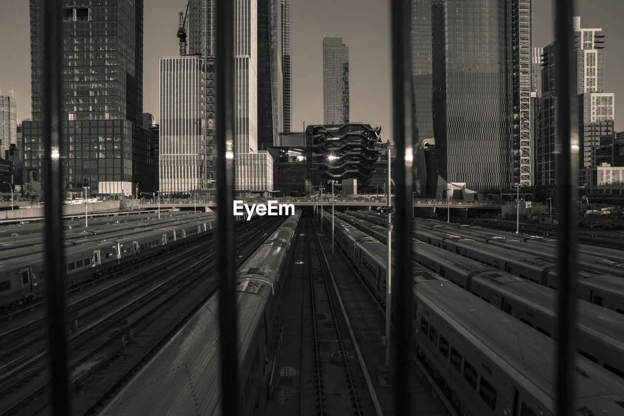 High angle view of railroad tracks by buildings in nyc