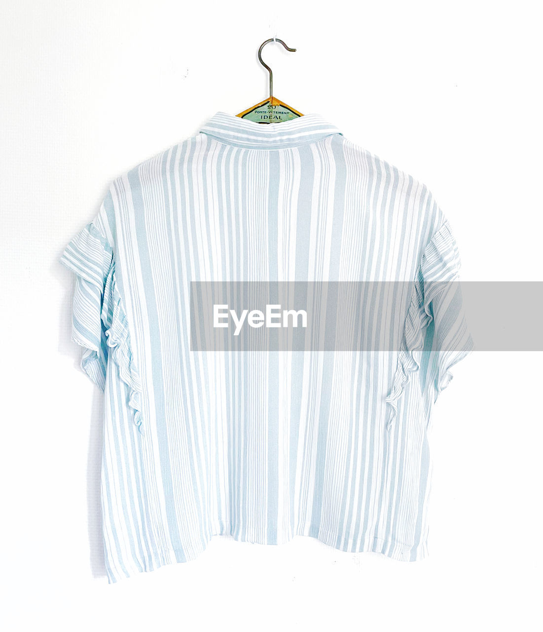 coathanger, sleeve, hanging, clothing, white background, white, studio shot, t-shirt, indoors, cut out, no people, striped, azure, aqua, casual clothing, fashion, copy space, button down shirt, shirt