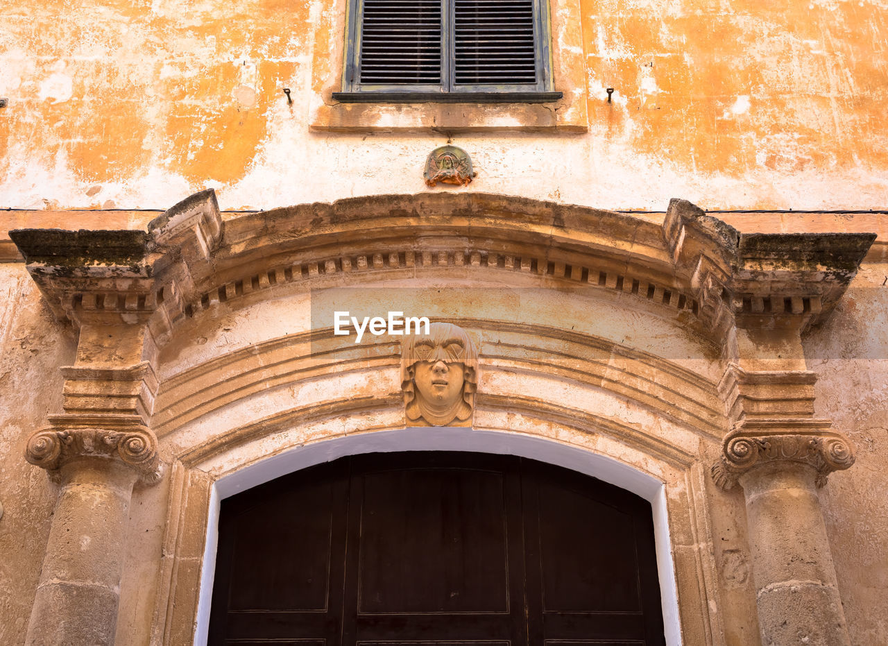 LOW ANGLE VIEW OF HISTORIC BUILDING