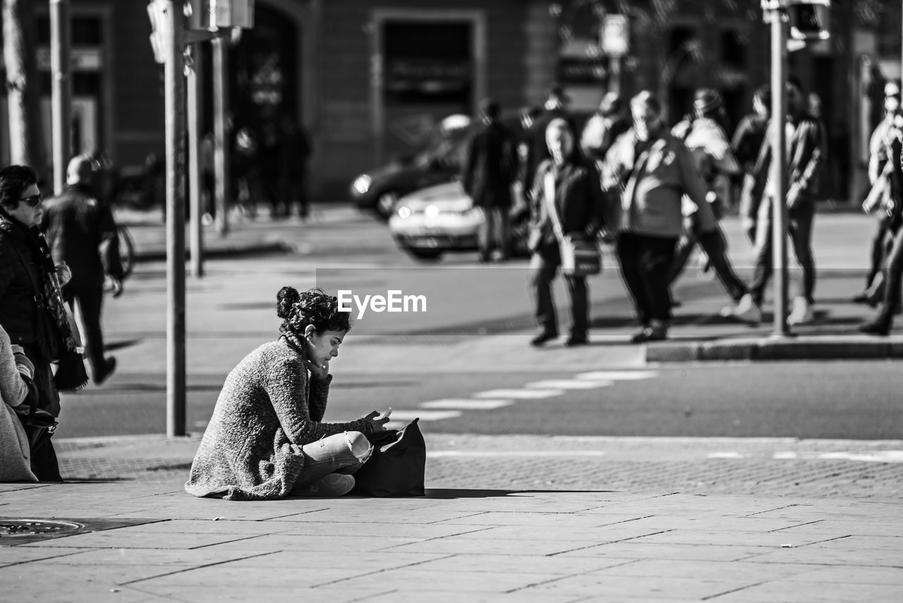 WOMAN ON CITY STREET