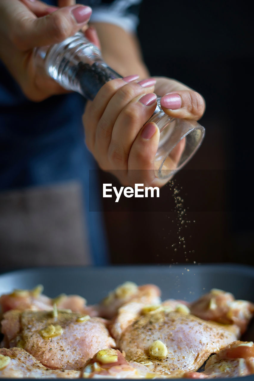 Cropped image of woman preparing food