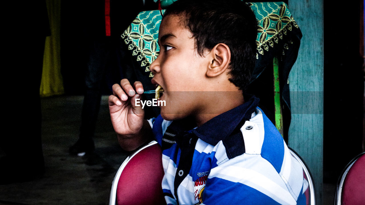 Boy eating food