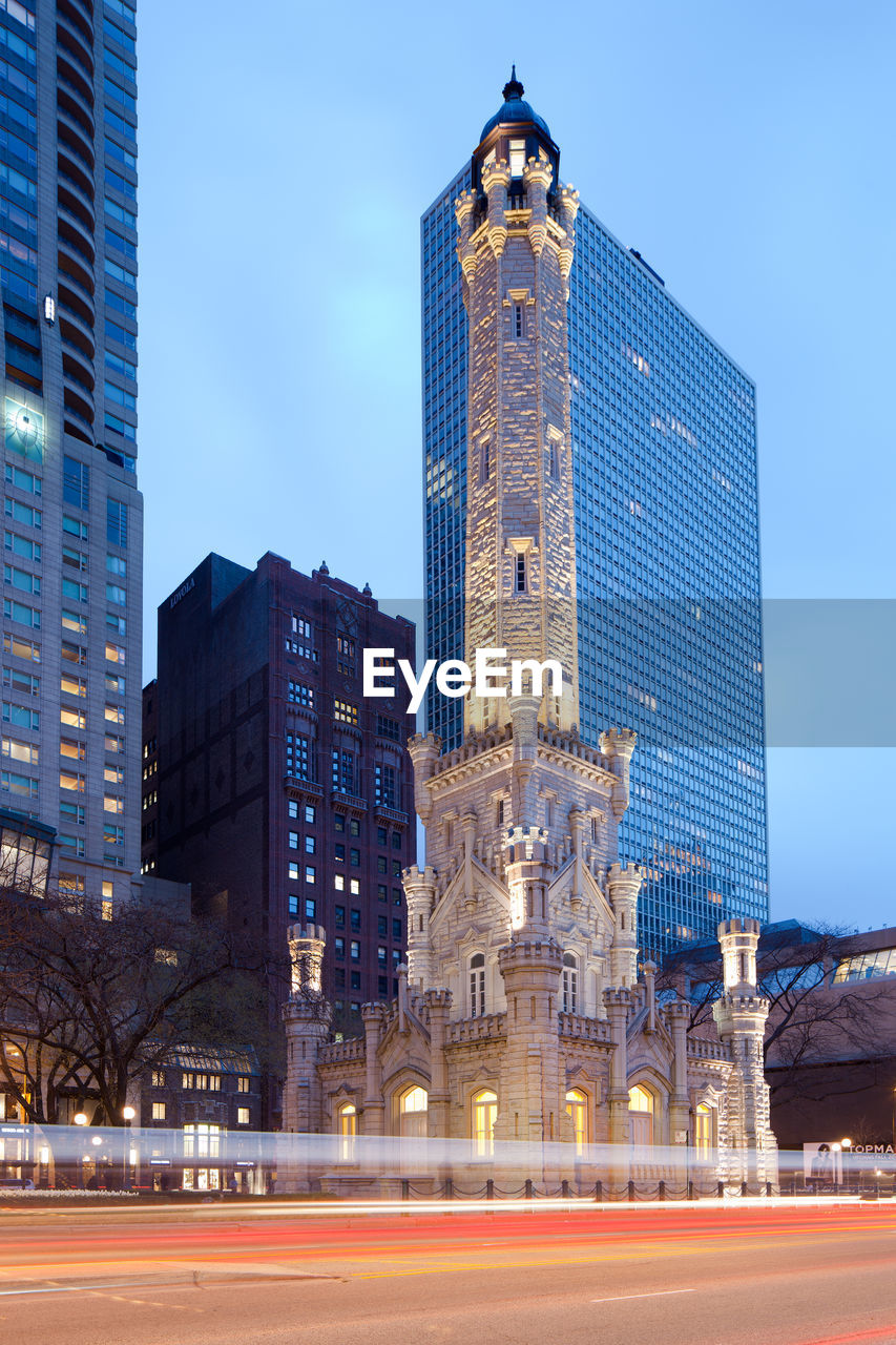 Chicago, illinois, united states - skyline of michigan avenue and water tower at dusk.