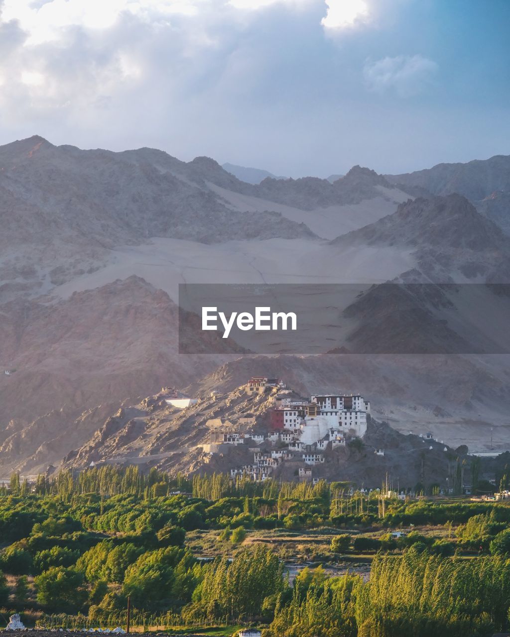 Scenic view of landscape and mountains against sky