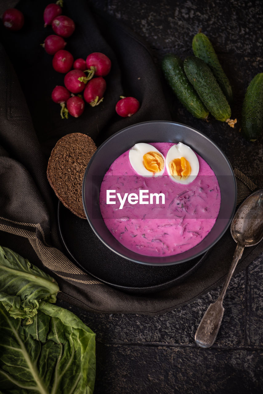 Traditional summer cold beetroot soup with kefir and boiled eggs