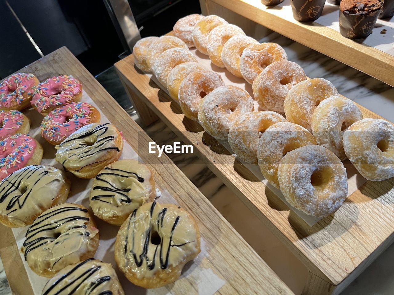 Close up group of delicious donuts on bakery shop, tasty multiple donuts, 