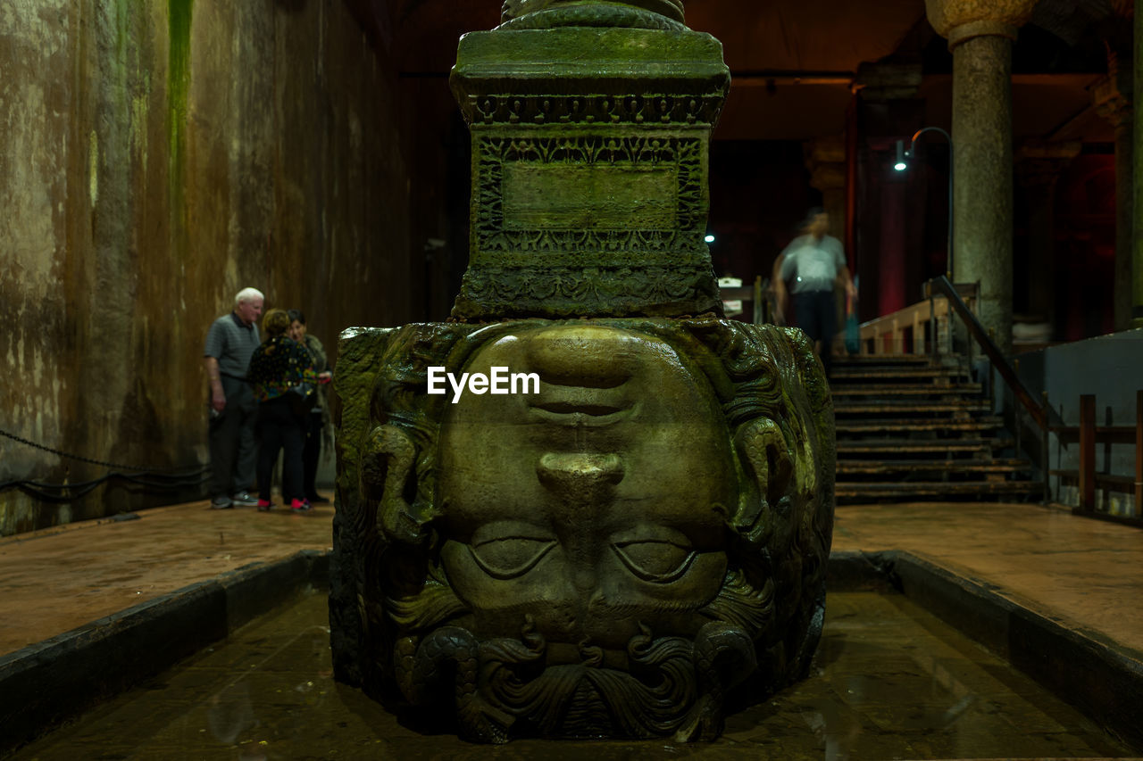 STATUE OF BUDDHA IN TEMPLE BUILDING