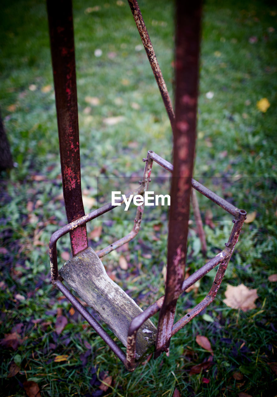 Close-up of rusty seesaw