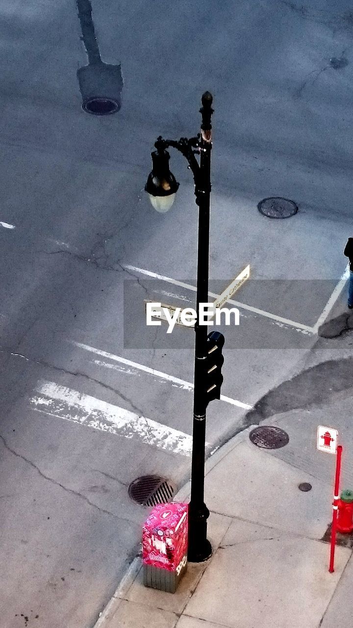 High angle view of lamp post by street