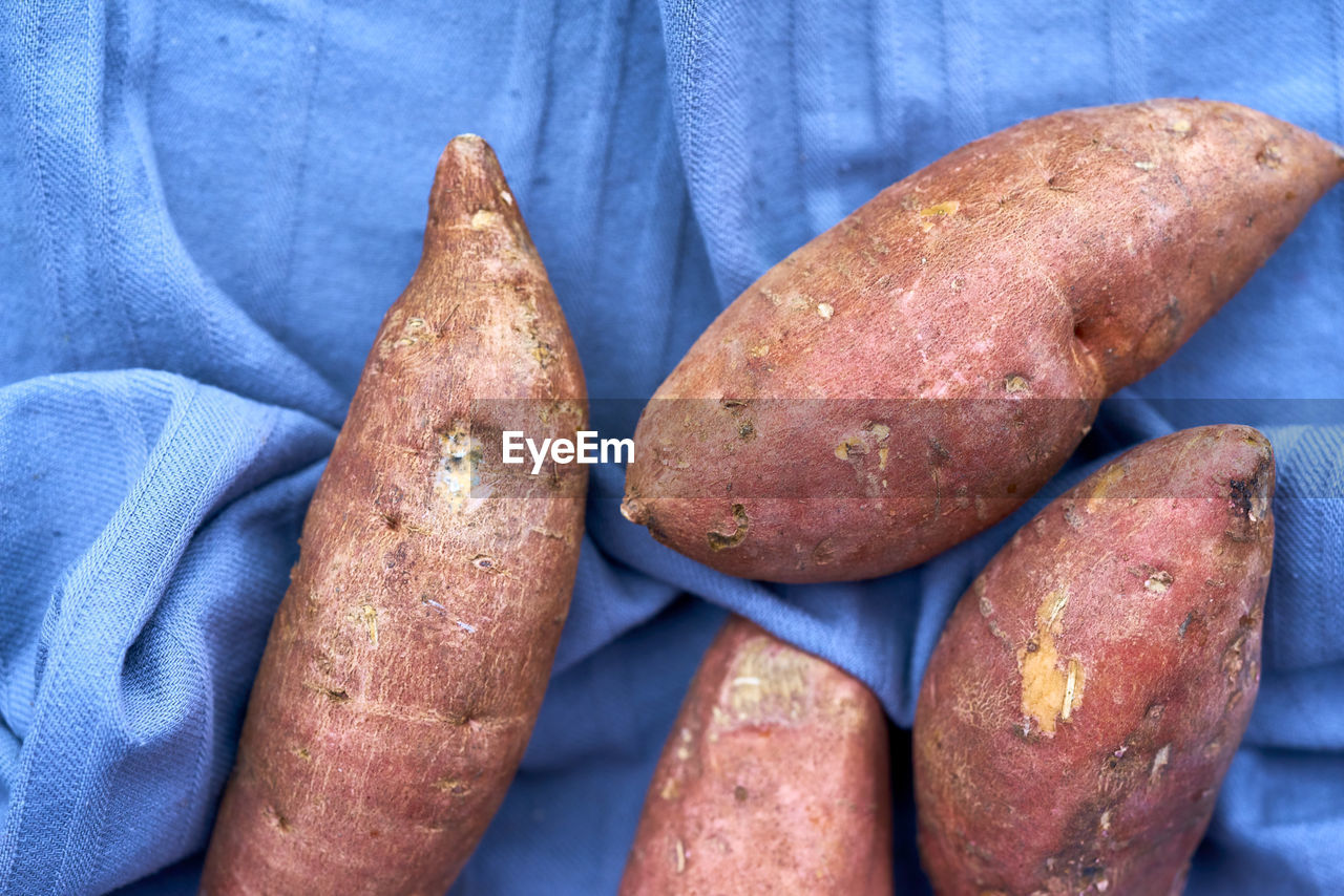 High angle view of sweet potatoes on table