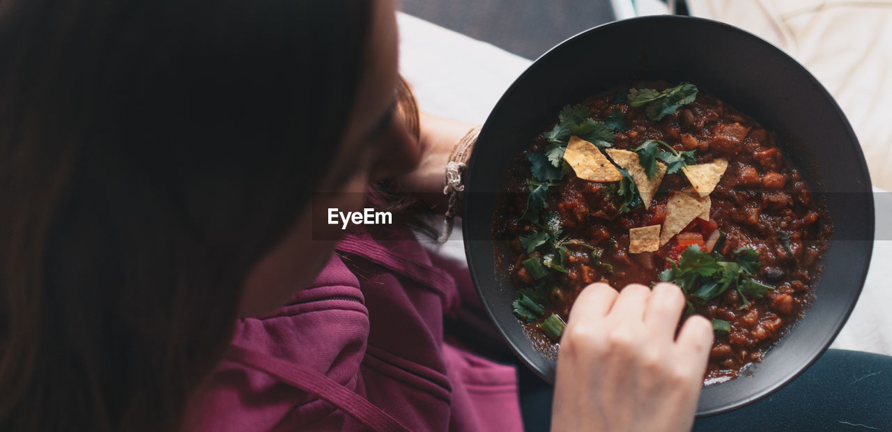 Woman eating mexican food