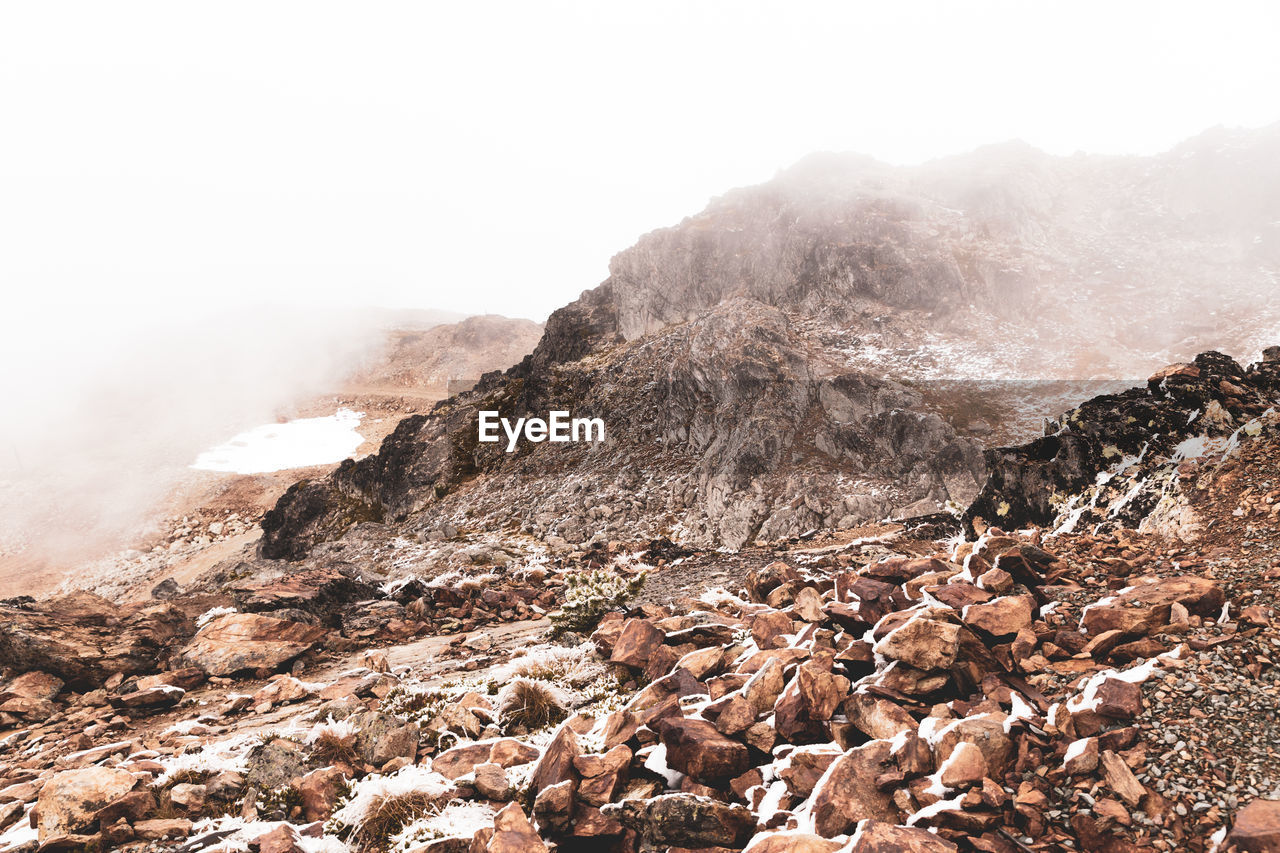 Scenic view of rocky mountains against sky